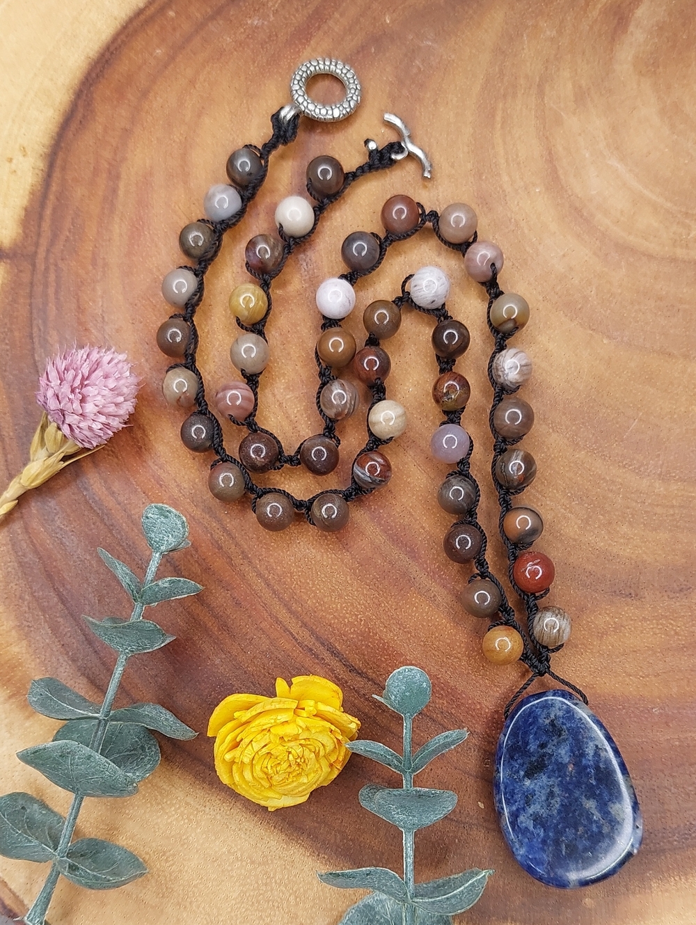 Hand Crafted Petrified Wood and Sodalite Necklace made by Rust Belt Raised